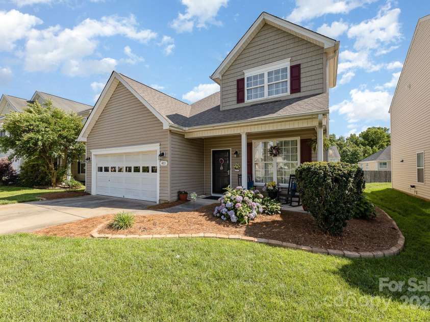 411 Summergate Drive, Winston Salem, NC 27103.  MLS# CAR4264420, YatesRealty ID 16942. Neighbors are close by but homes are positioned to still offer privacy from the front porch.