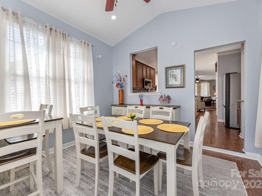 411 Summergate Drive, Winston Salem, NC 27103.  MLS# CAR4264420, YatesRealty ID 16942. Spacious Dining Room offers ample seating for everyone with tons of natural light to illuminate the space.