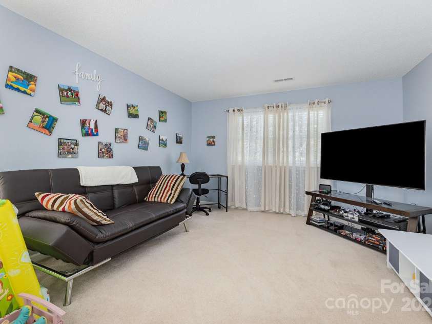 411 Summergate Drive, Winston Salem, NC 27103.  MLS# CAR4264420, YatesRealty ID 16942. Upstairs- 2nd bedroom is huge.