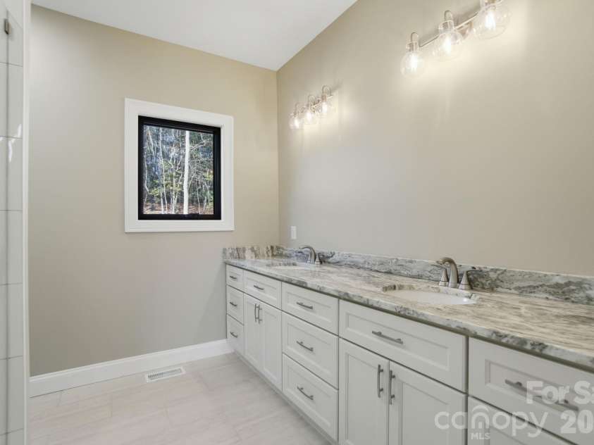 1597 Compass Court, Granite Falls, NC 28630.  MLS# CAR4331950, YatesRealty ID 16943. Double Sink Vanity in Master Bath