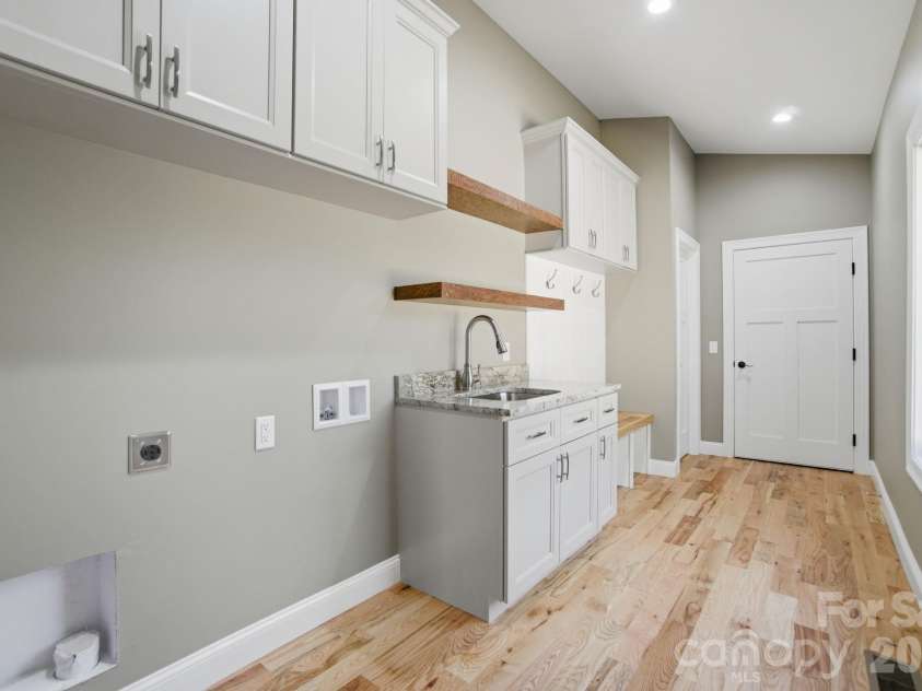 1597 Compass Court, Granite Falls, NC 28630.  MLS# CAR4331950, YatesRealty ID 16943. Laundry Room