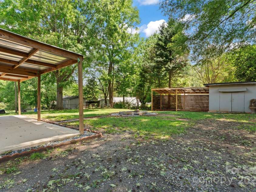 2401 Woodleaf Drive, Gastonia, NC 28052.  MLS# CAR4257882, YatesRealty ID 16943. Fenced yard