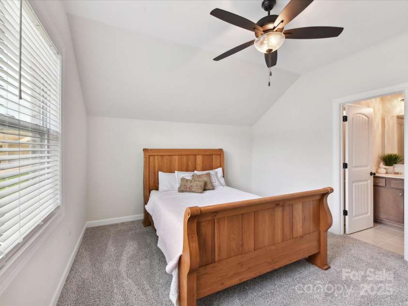 873 Penny Royal Avenue, Fort Mill, SC 29715.  MLS# CAR4234425, YatesRealty ID 16944. Bedroom 2 with Fan and Private Bath
