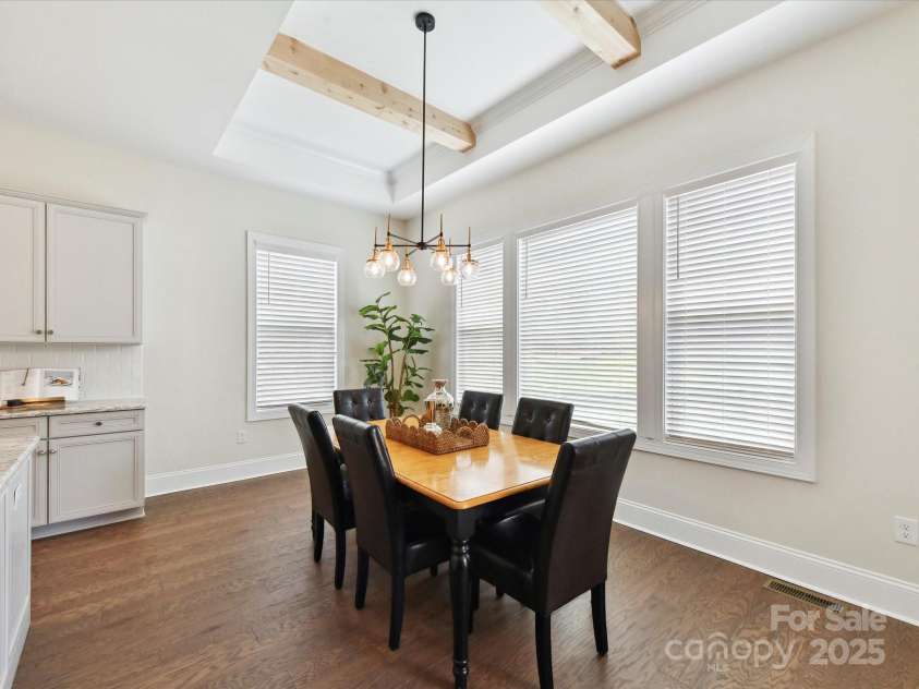 873 Penny Royal Avenue, Fort Mill, SC 29715.  MLS# CAR4234425, YatesRealty ID 16944. Breakfast Room enhanced with Beams in Tray Ceiling