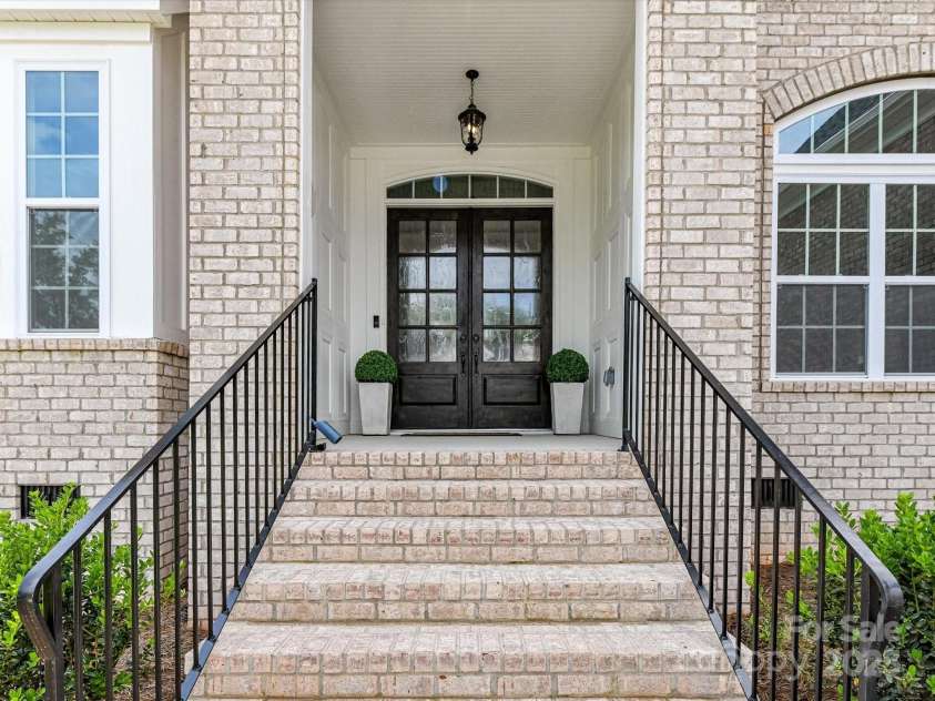 873 Penny Royal Avenue, Fort Mill, SC 29715.  MLS# CAR4234425, YatesRealty ID 16944. Covered Entry accented with Trim