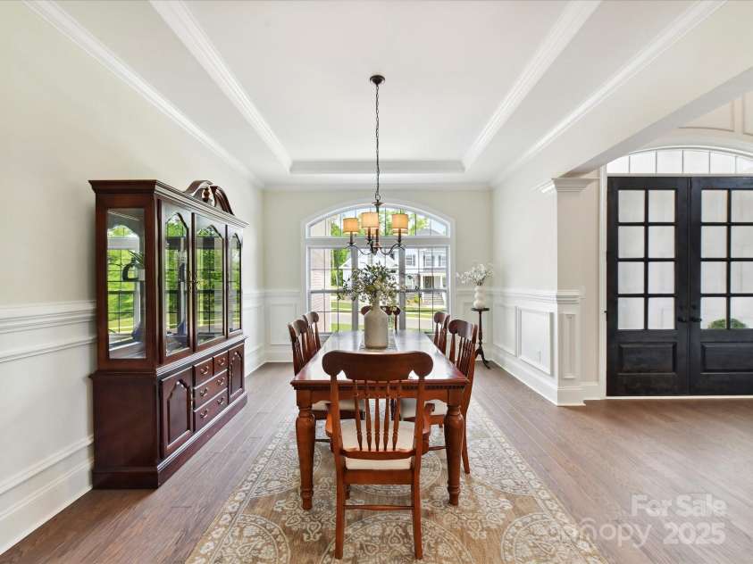 873 Penny Royal Avenue, Fort Mill, SC 29715.  MLS# CAR4234425, YatesRealty ID 16944. Dining Room with Crown, Chair and Picture Frame Moldings