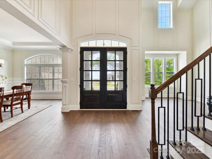 873 Penny Royal Avenue, Fort Mill, SC 29715.  MLS# CAR4234425, YatesRealty ID 16944. Double Wood front Door with Pitted Glass and Transom Window