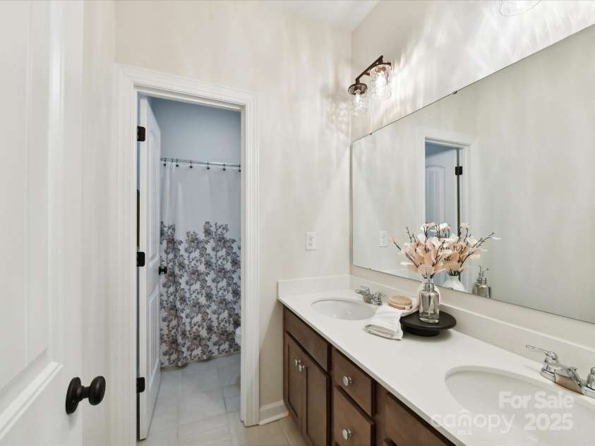873 Penny Royal Avenue, Fort Mill, SC 29715.  MLS# CAR4234425, YatesRealty ID 16944. Full Bath 3 with Dual Sinks and Tiled Flooring