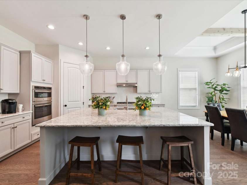 873 Penny Royal Avenue, Fort Mill, SC 29715.  MLS# CAR4234425, YatesRealty ID 16944. Large Island with Pendant Lighting