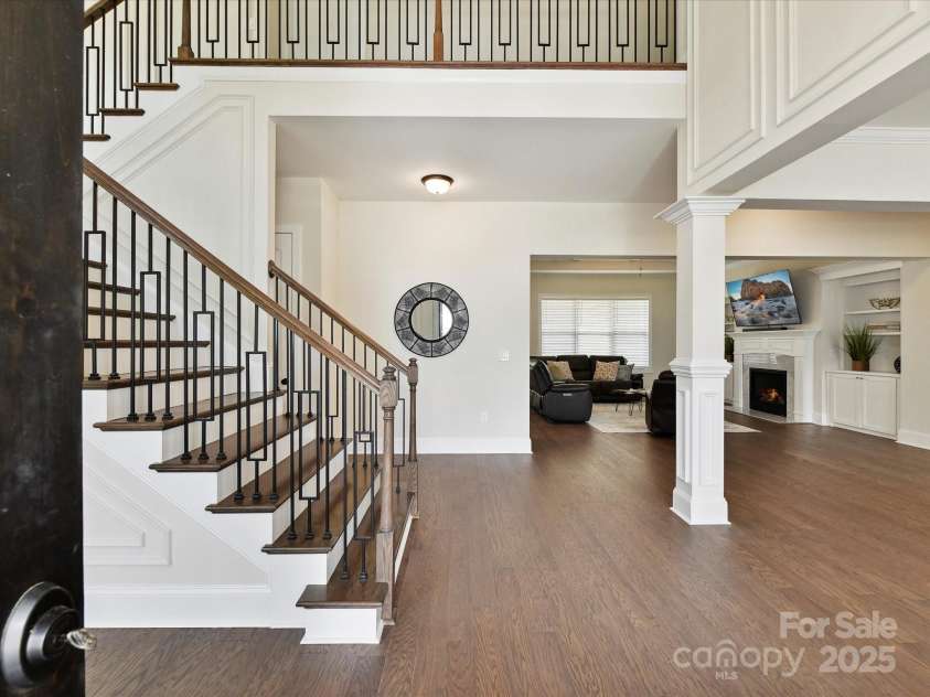 873 Penny Royal Avenue, Fort Mill, SC 29715.  MLS# CAR4234425, YatesRealty ID 16944. Open Foyer views Iron Balusters and Wood Treads on Staircase