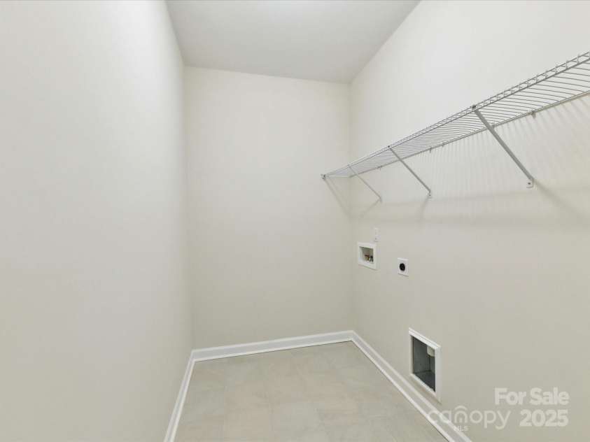 873 Penny Royal Avenue, Fort Mill, SC 29715.  MLS# CAR4234425, YatesRealty ID 16944. Upper Level Laundry Room