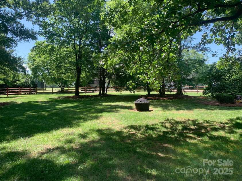 105 Prairie Rose Court, Waxhaw, NC 28173.  MLS# CAR4264046, YatesRealty ID 16945. Private .93 Acre Fenced Yard