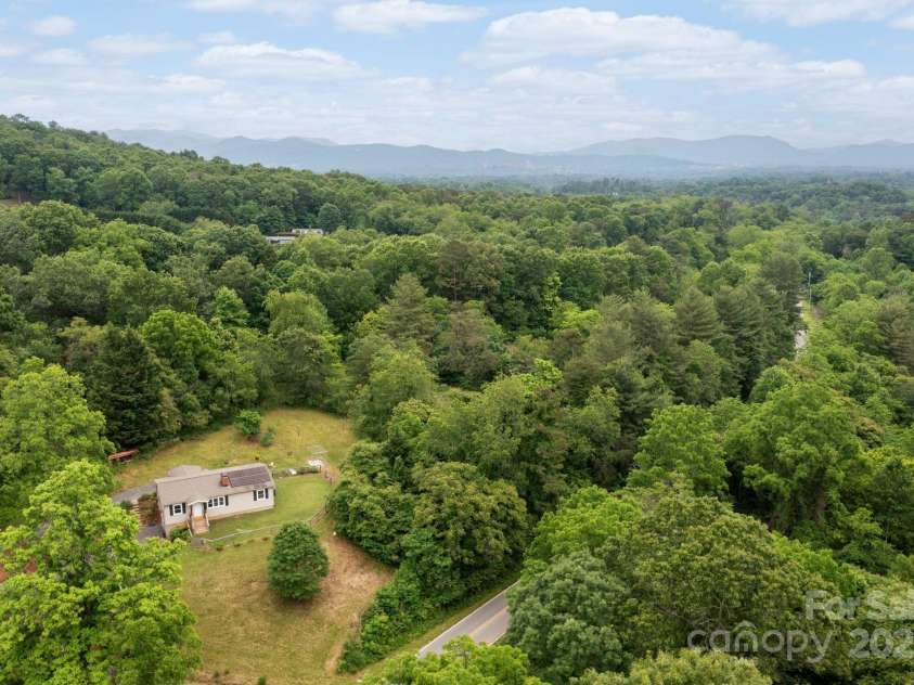 205 Cowan Cove Road, Asheville, NC 28806.  MLS# CAR4265297, YatesRealty ID 16948. Private but close to all fun things AVL!