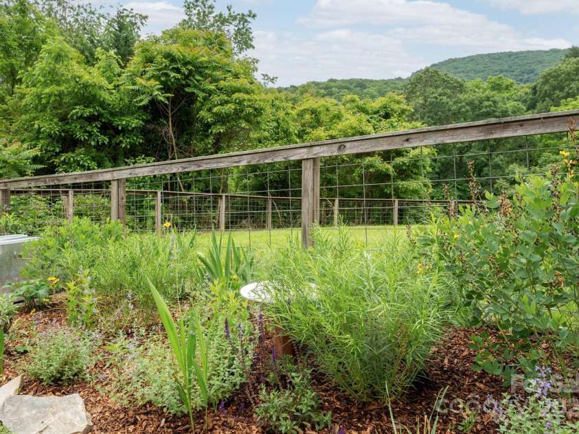 205 Cowan Cove Road, Asheville, NC 28806.  MLS# CAR4265297, YatesRealty ID 16948. Side and front yard fenced