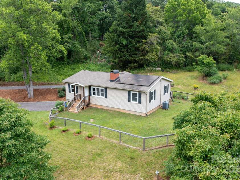 205 Cowan Cove Road, Asheville, NC 28806.  MLS# CAR4265297, YatesRealty ID 16948. Solar panels for low utility bills and a small carbon footprint - off-grid??
