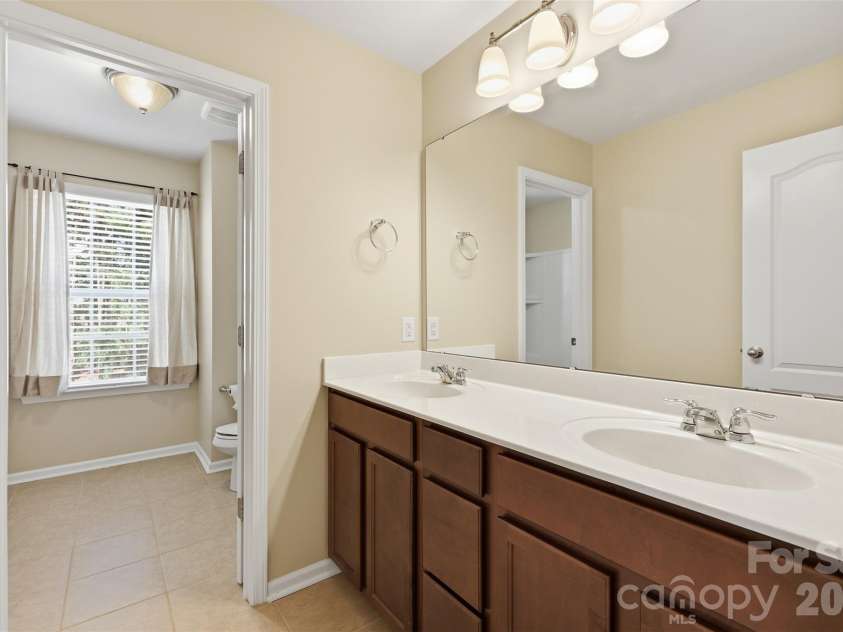 962 Treasure Court, Fort Mill, SC 29708.  MLS# CAR4358707, YatesRealty ID 16948. Guest bath upper level; separate toilet/shower room