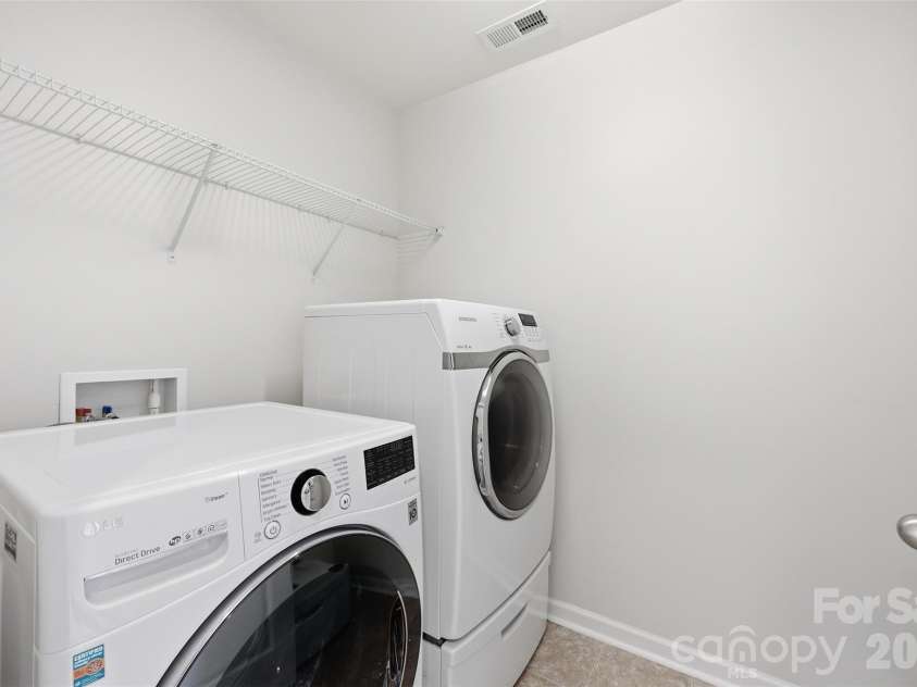 962 Treasure Court, Fort Mill, SC 29708.  MLS# CAR4358707, YatesRealty ID 16948. Laundry room upper level