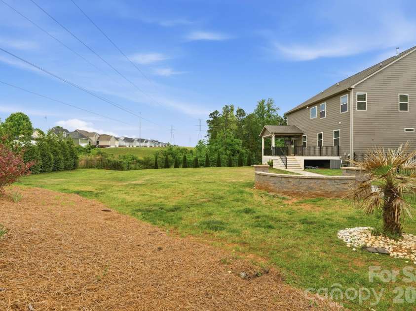 2612 Keady Mill Loop, Kannapolis, NC 28081.  MLS# CAR4318047, YatesRealty ID 16950. Private Backyard