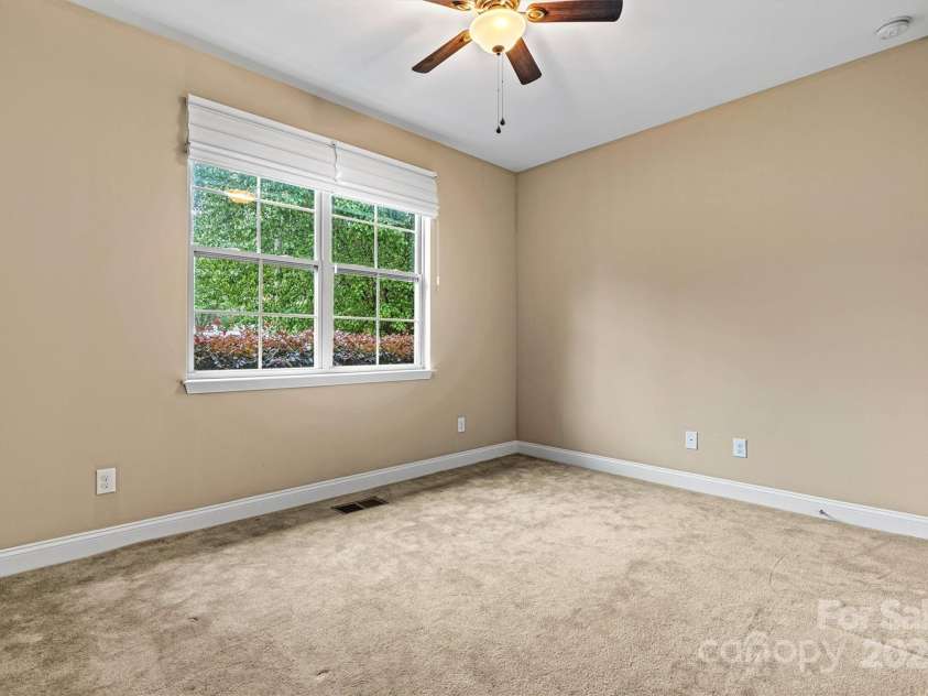 7020 Cedar Ridge Court, Mount Holly, NC 28120.  MLS# CAR4256213, YatesRealty ID 16957. 2nd bedroom is on the front of the home.