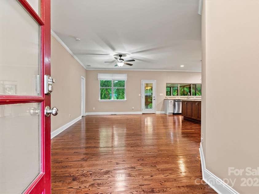 7020 Cedar Ridge Court, Mount Holly, NC 28120.  MLS# CAR4256213, YatesRealty ID 16957. Come on in!  Welcoming entry hall brings you into the huge open concept Living/Kitchen space. Aren't the hardwood floors absolutely gorgeous?!?