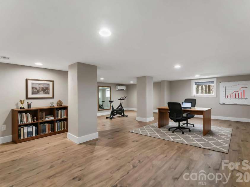 522 Brandon Road, Black Mountain, NC 28711.  MLS# CAR4353492, YatesRealty ID 16958. Finished basement bonus space with low ceiling height - shown virtually staged as a home office