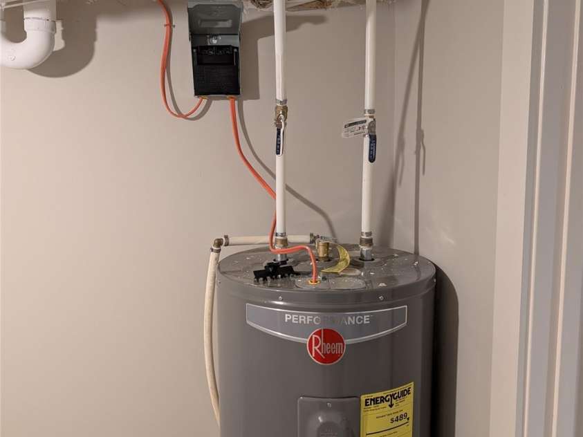 522 Brandon Road, Black Mountain, NC 28711.  MLS# CAR4404394, YatesRealty ID 16958. Water Heater