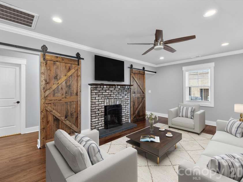 307 Peterson Drive, Charlotte, NC 28217.  MLS# CAR4363768, YatesRealty ID 16964. Virtually Staged Living Room