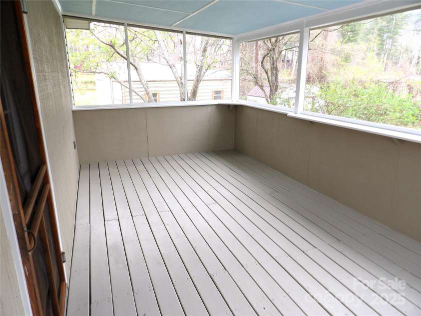 106 Pinetree Drive, Black Mountain, NC 28711.  MLS# CAR4246572, YatesRealty ID 16966. Back screened in deck