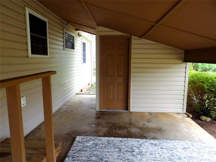 106 Pinetree Drive, Black Mountain, NC 28711.  MLS# CAR4246572, YatesRealty ID 16966. Carport