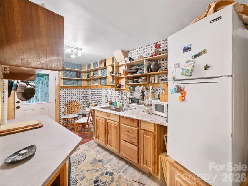278 Mount View Drive, Burnsville, NC 28714.  MLS# CAR4259285, YatesRealty ID 16967. Basement In-Law Suite Kitchenette