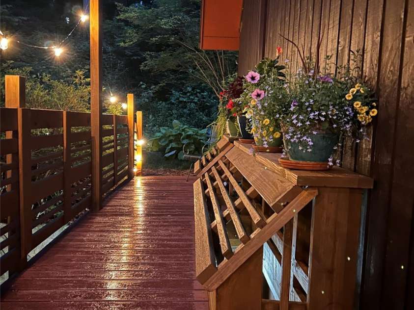 278 Mount View Drive, Burnsville, NC 28714.  MLS# CAR4259285, YatesRealty ID 16967. Evening on the Deck with New Window Boxes