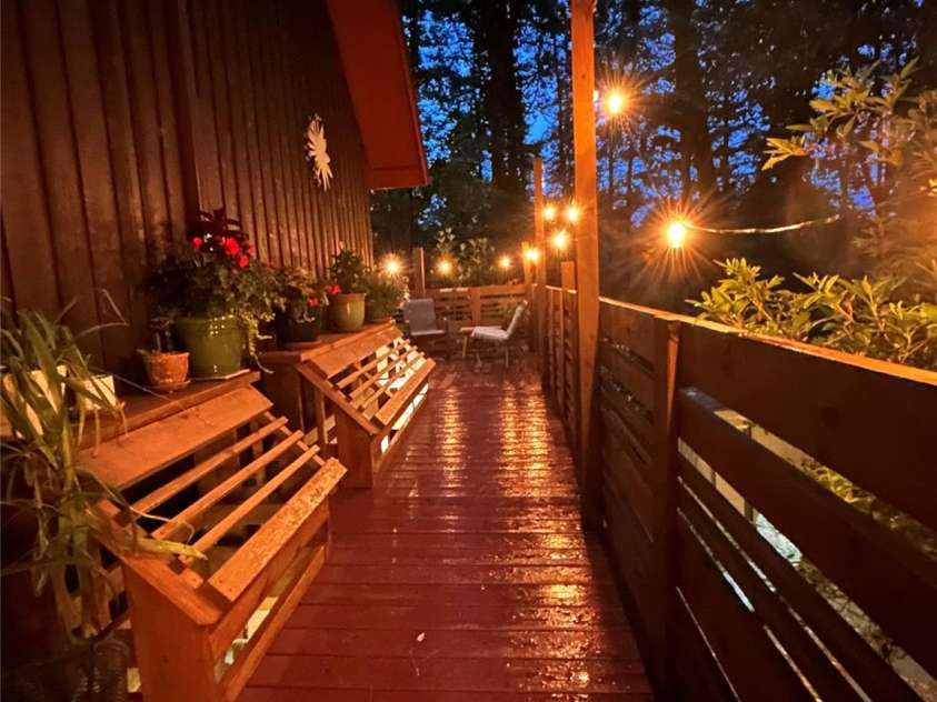 278 Mount View Drive, Burnsville, NC 28714.  MLS# CAR4259285, YatesRealty ID 16967. Evening on the Deck with New Window Boxes
