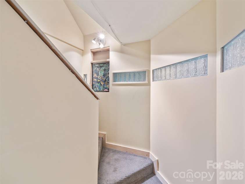 278 Mount View Drive, Burnsville, NC 28714.  MLS# CAR4259285, YatesRealty ID 16967. Stairway Leading to Basement