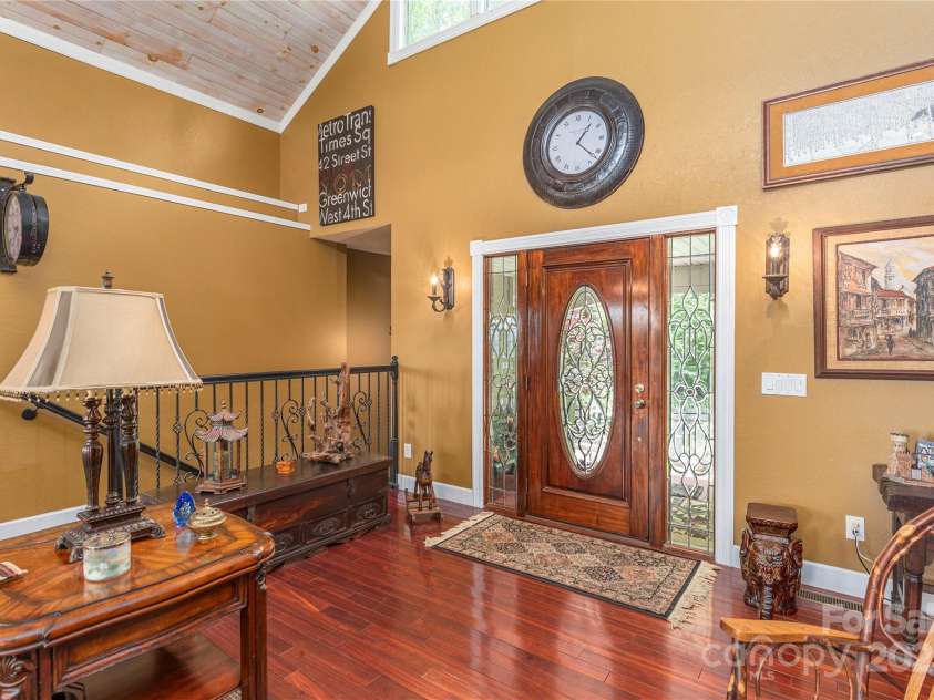 1706 Rock House Cove Road, Clyde, NC 28721.  MLS# CAR4263757, YatesRealty ID 16969. Beveled glass front door