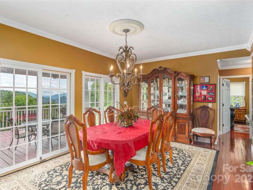 1706 Rock House Cove Road, Clyde, NC 28721.  MLS# CAR4263757, YatesRealty ID 16969. Dine with a view