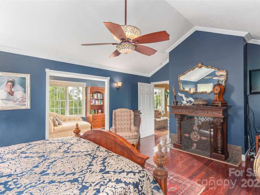 1706 Rock House Cove Road, Clyde, NC 28721.  MLS# CAR4263757, YatesRealty ID 16969. See through fireplace