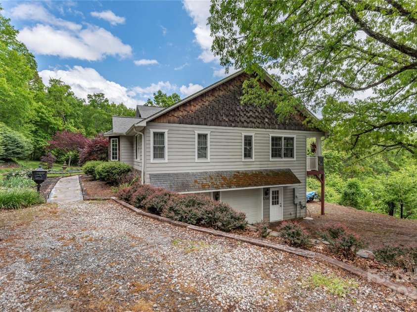 1706 Rock House Cove Road, Clyde, NC 28721.  MLS# CAR4263757, YatesRealty ID 16969. Two car garage with easy turn around