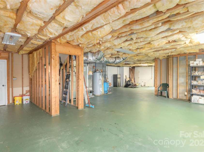 1706 Rock House Cove Road, Clyde, NC 28721.  MLS# CAR4263757, YatesRealty ID 16969. Unfinished basement - stubbed for additional square footage