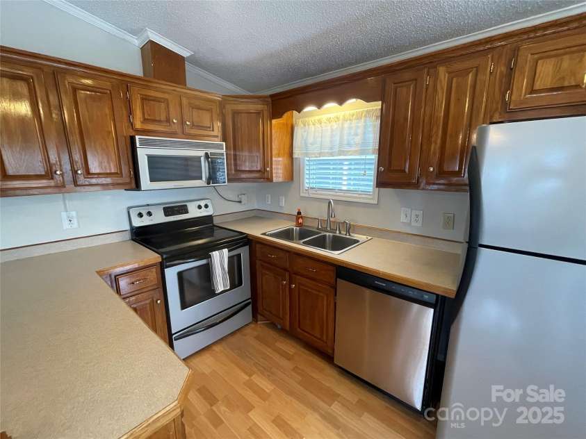116 Dove Lane, New London, NC 28127.  MLS# CAR4249936, YatesRealty ID 16972. 
