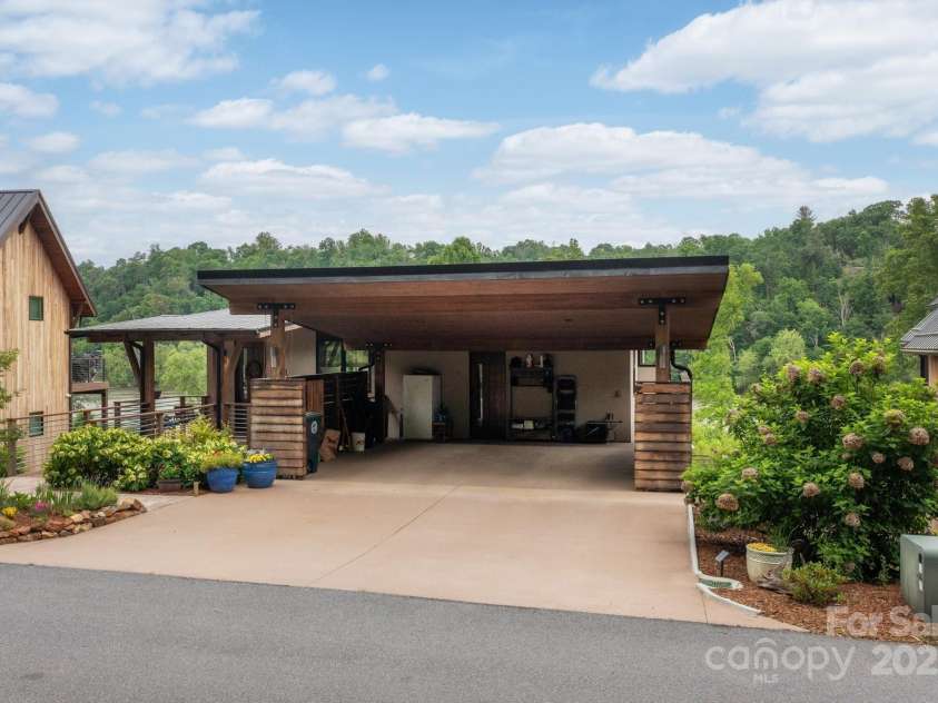 34 River Run, Asheville, NC 28804.  MLS# CAR4260631, YatesRealty ID 16973. Carport parking for 2