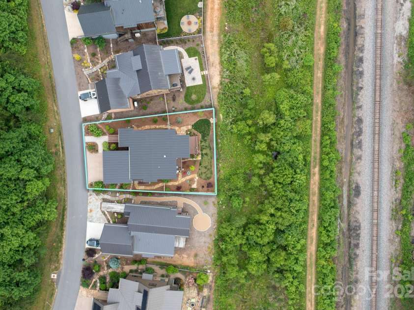 34 River Run, Asheville, NC 28804.  MLS# CAR4260631, YatesRealty ID 16973. Come, be rooted by the river