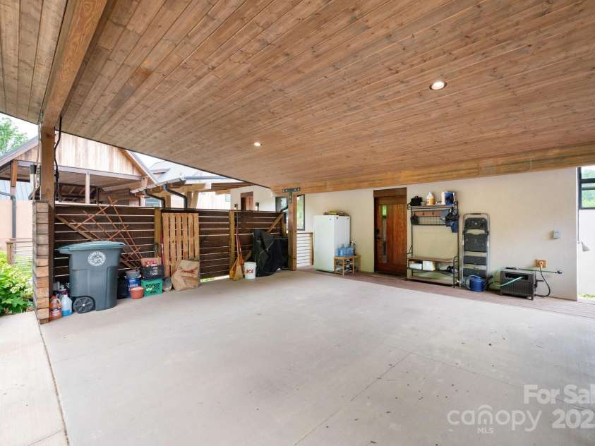 34 River Run, Asheville, NC 28804.  MLS# CAR4260631, YatesRealty ID 16973. Covered parking, plug for an EV charger