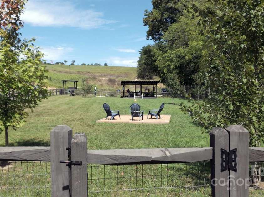 34 River Run, Asheville, NC 28804.  MLS# CAR4260631, YatesRealty ID 16973. For the pups!