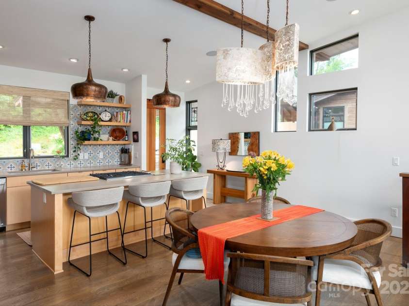 34 River Run, Asheville, NC 28804.  MLS# CAR4260631, YatesRealty ID 16973. Quartz countertops and curated appliances