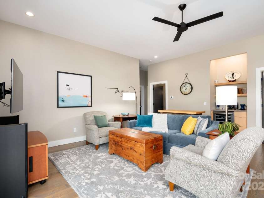 34 River Run, Asheville, NC 28804.  MLS# CAR4260631, YatesRealty ID 16973. Second living room walks out to the backyard