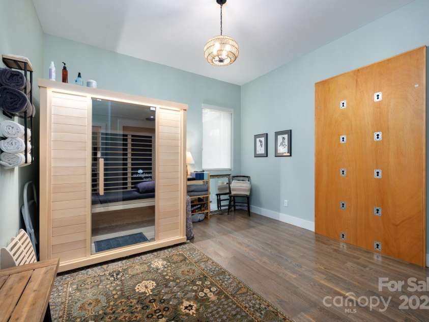 34 River Run, Asheville, NC 28804.  MLS# CAR4260631, YatesRealty ID 16973. Yoga wall and sauna do not convey