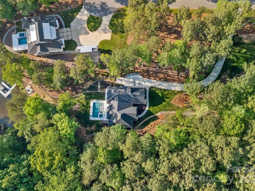 127 Holt Lane, Mooresville, NC 28117.  MLS# CAR4248273, YatesRealty ID 16978. Aerial of Lakefront Home