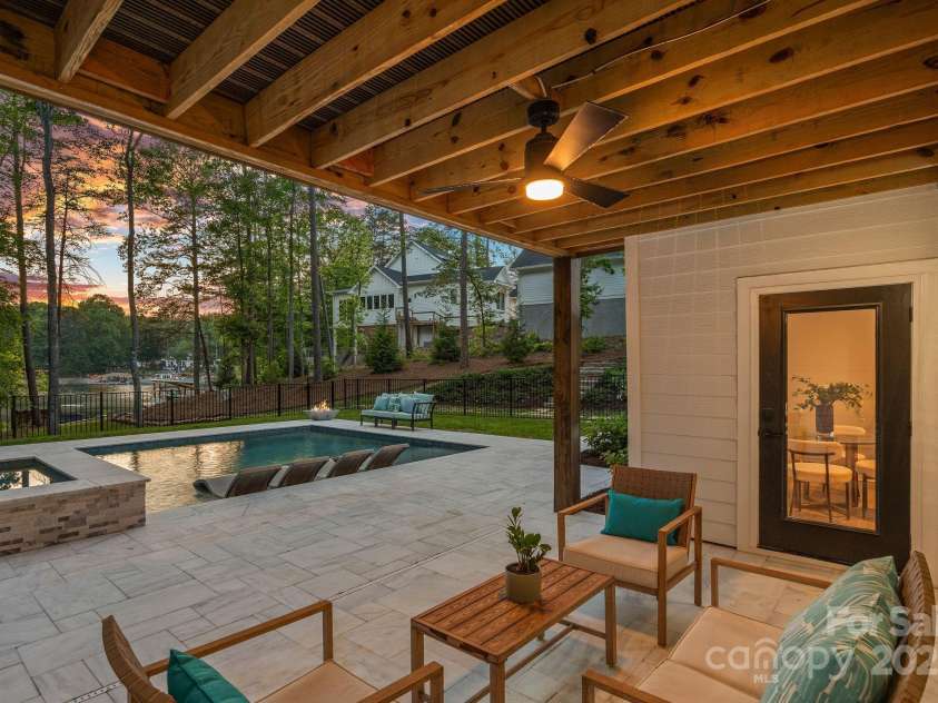 127 Holt Lane, Mooresville, NC 28117.  MLS# CAR4248273, YatesRealty ID 16978. Basement Level - Covered Patio