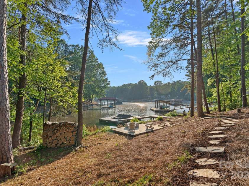 127 Holt Lane, Mooresville, NC 28117.  MLS# CAR4248273, YatesRealty ID 16978. Path to Lake