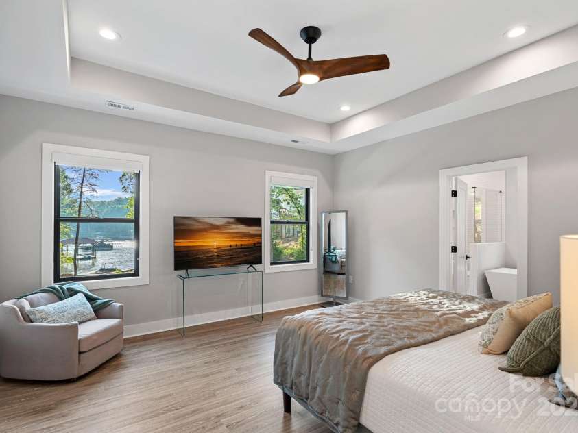 127 Holt Lane, Mooresville, NC 28117.  MLS# CAR4248273, YatesRealty ID 16978. Primary Suite on Main with Lake Views